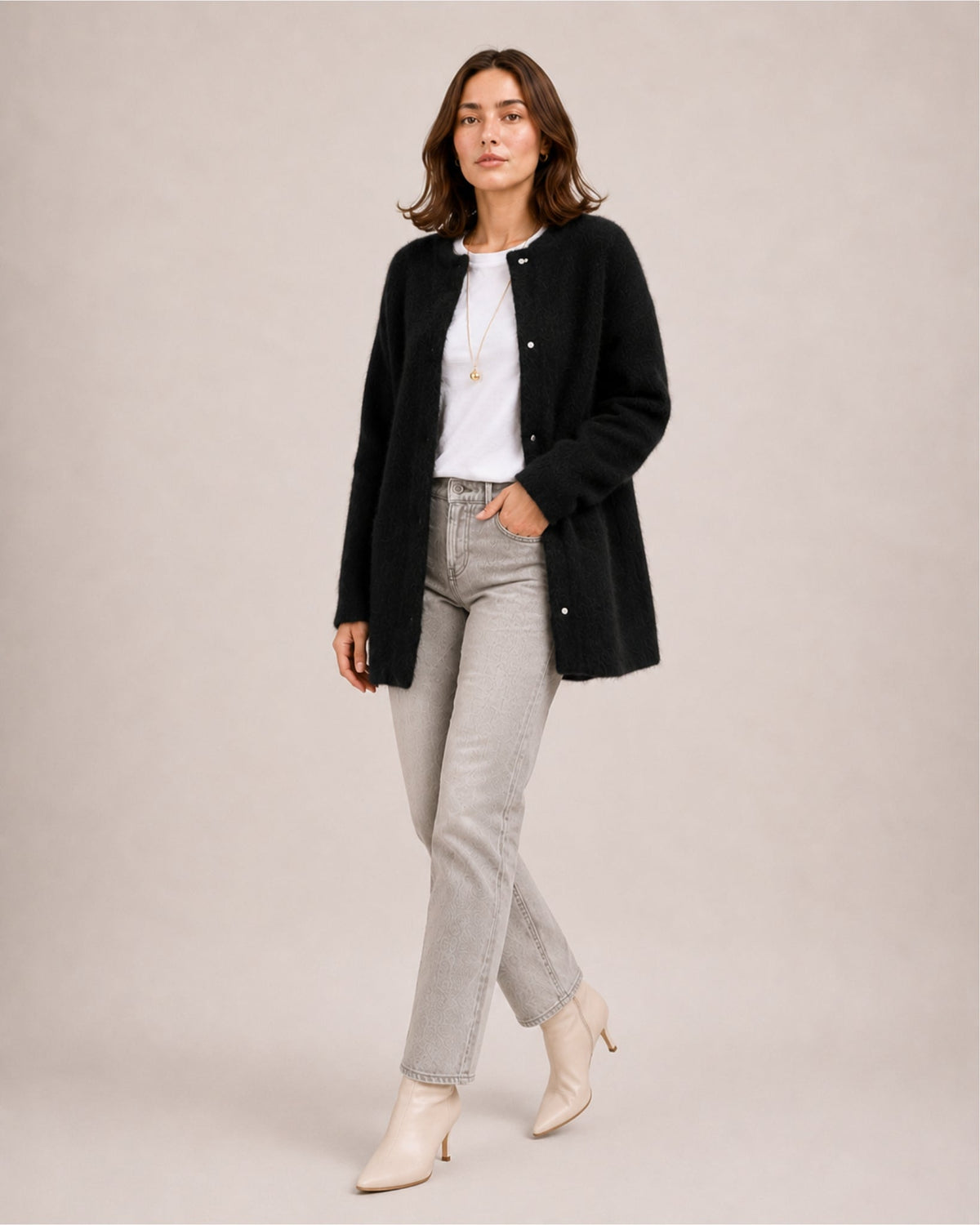 Women's longline fluffy cardigan with a round neck and side pockets - black