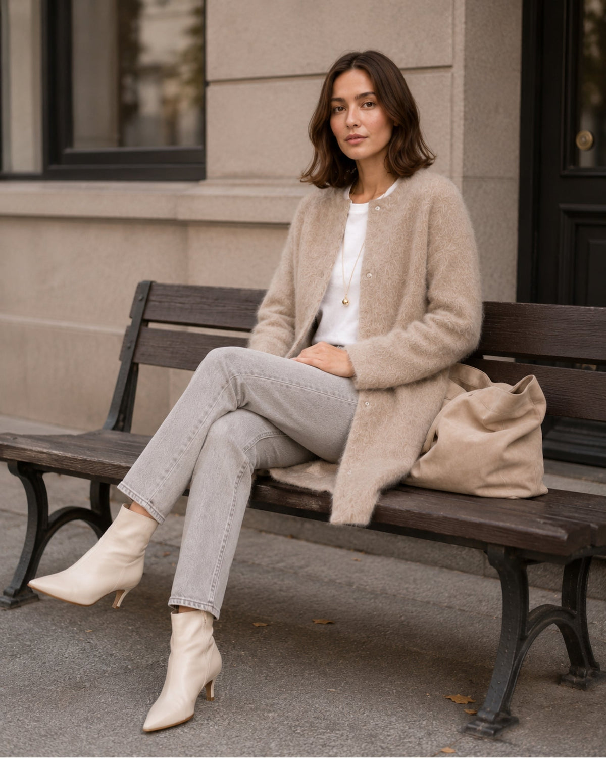 Women's longline fluffy cardigan with a round neck and side pockets