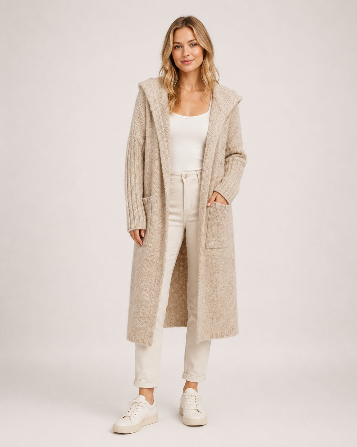 Women's longline hooded cardigan with an open front and patch pockets