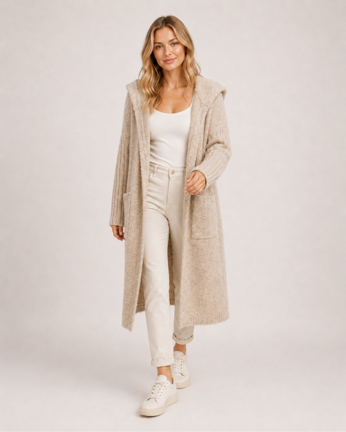 Women's longline hooded cardigan with an open front and patch pockets
