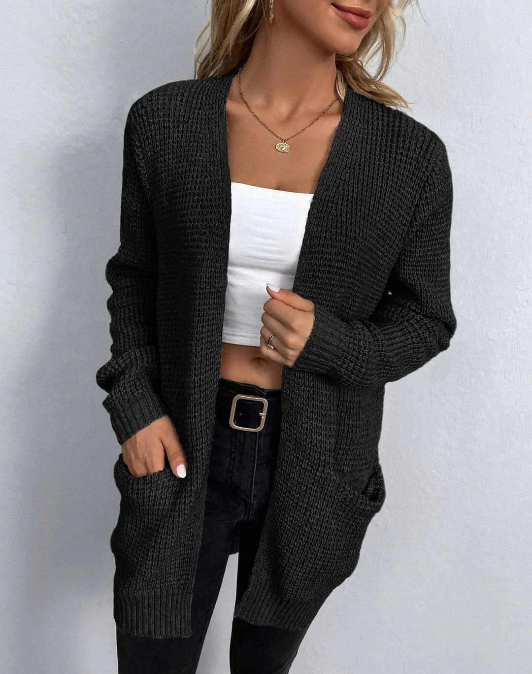 Women's longline waffle knit cardigan with an open front and patch pockets - black