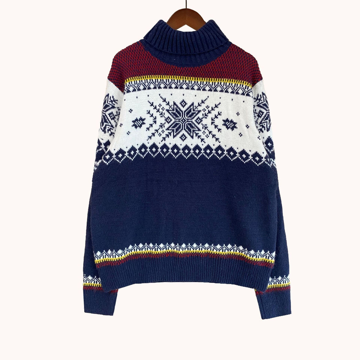 Matching his and hers Fair Isle Christmas jumper with a stand-up neck