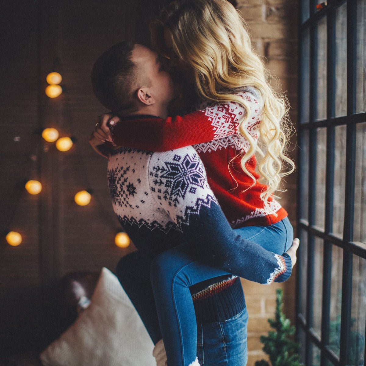 Matching his and hers Fair Isle Christmas jumper with a stand-up neck
