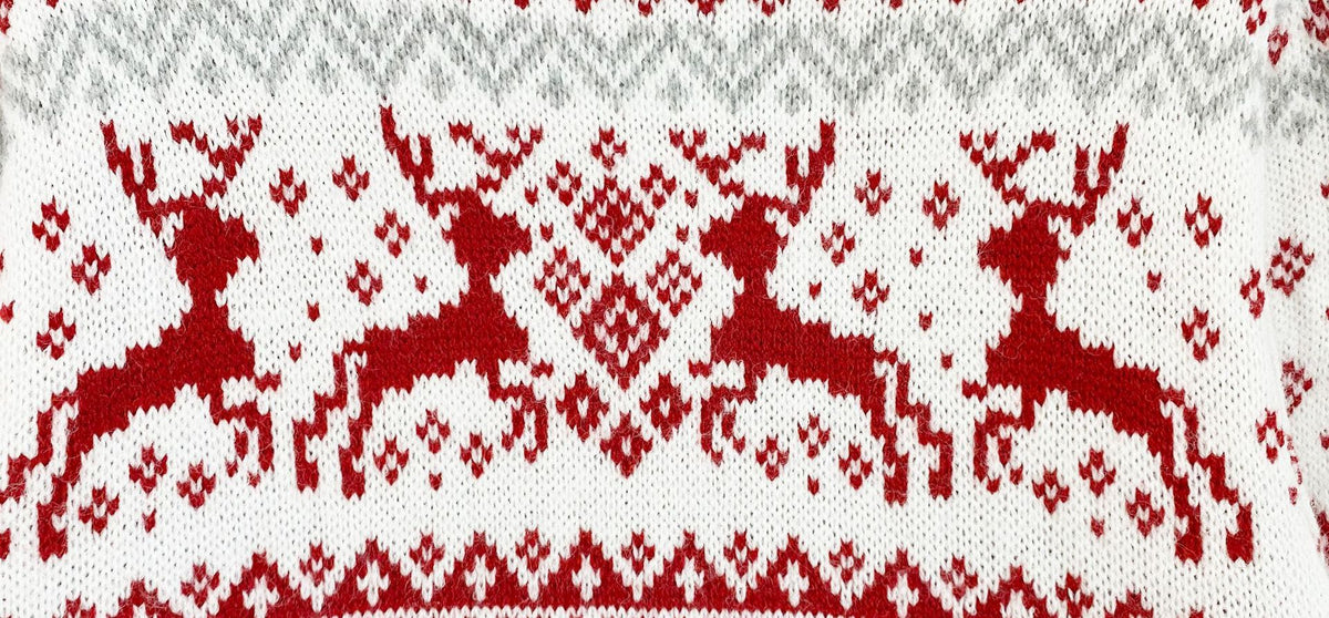 Matching his and hers Fair Isle Christmas jumper with a stand-up neck