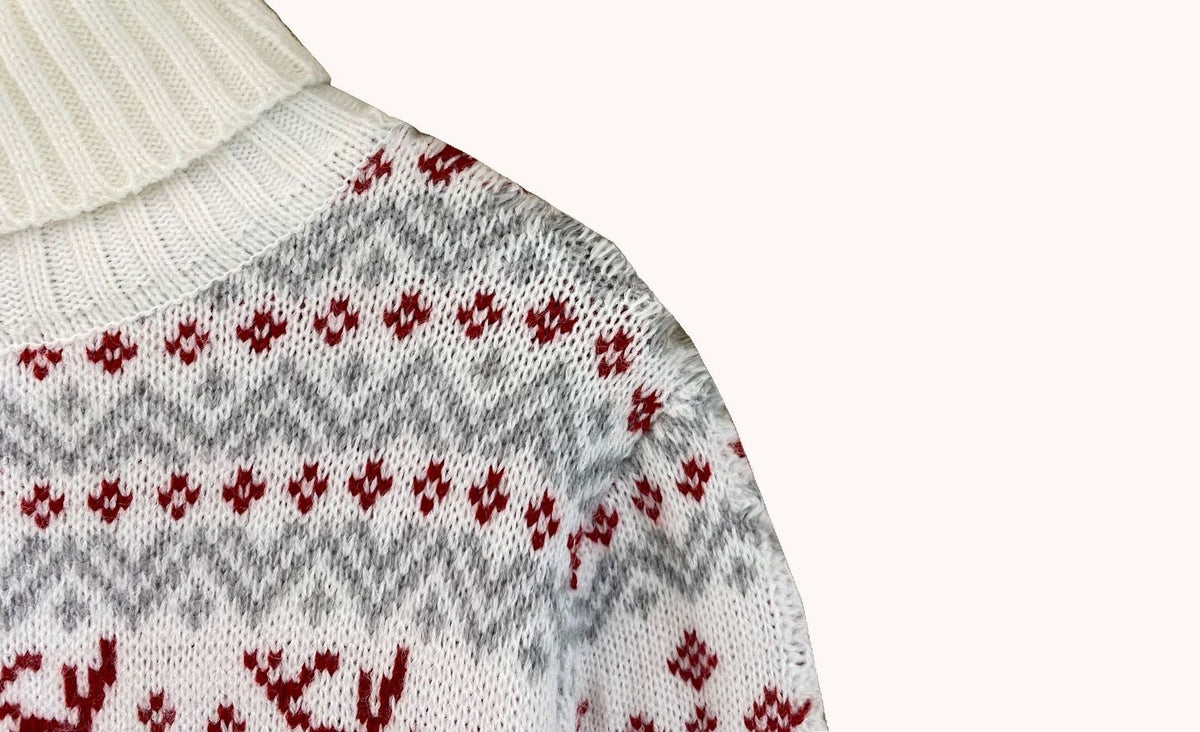 Matching his and hers Fair Isle Christmas jumper with a stand-up neck