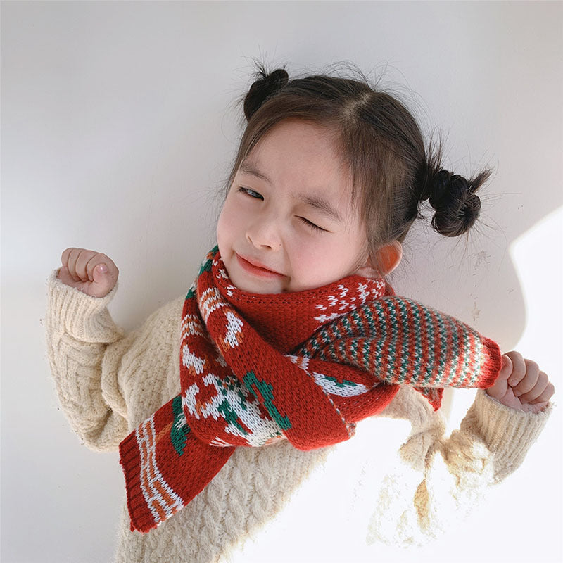 Red knitted Christmas scarf with a reindeer and trees, for parent and child