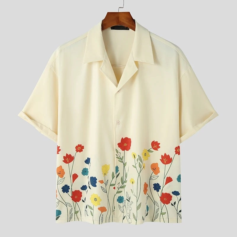 Men's shirt with an open camp collar and embroidered flowers along the hem