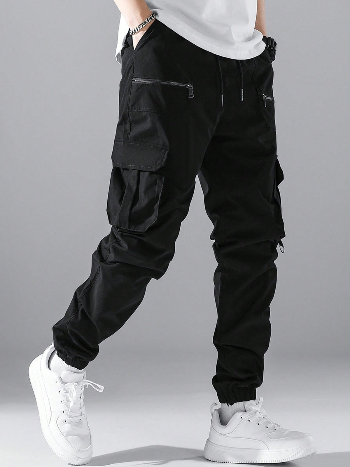 Cargo joggers for men with a drawcord waist, zip pockets, thigh flap pockets and cuffed ankles - black