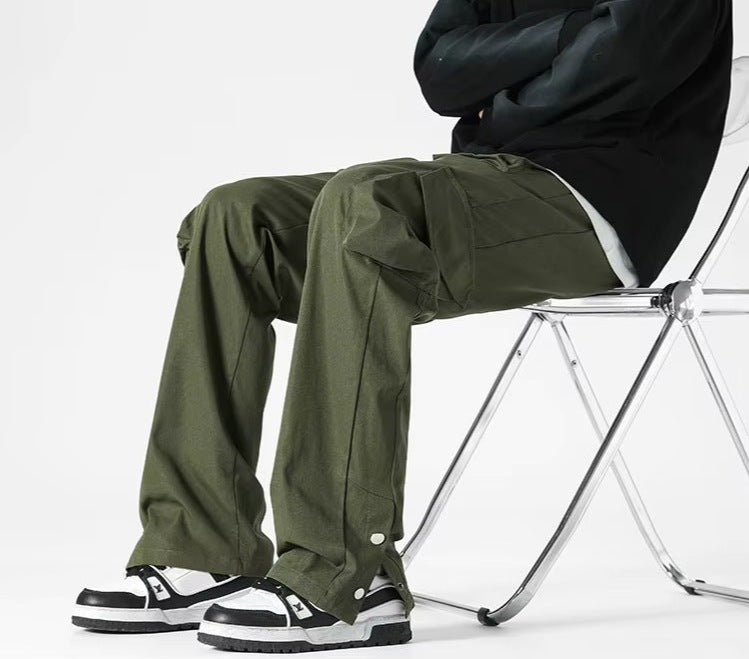 Men's cargo trousers with flap pockets at the waist and thighs, a drawcord and popper hems - view 7