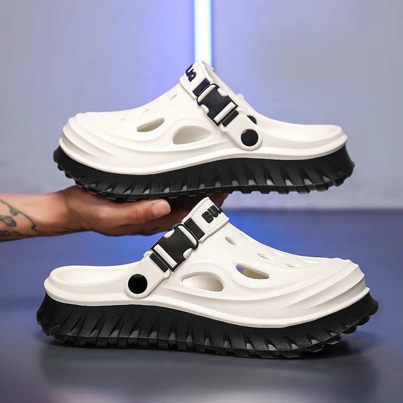 EVA clogs with a high sole, closed toe, vent holes and buckle heel strap - white / black sole
