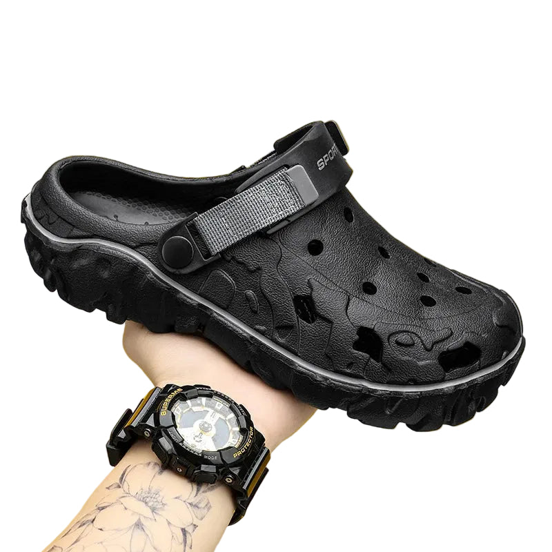 Men's EVA clogs with vent holes, side cut-outs, chunky lug sole and pivoting heel strap - black