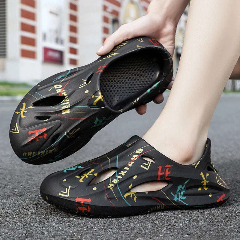 Men's one-piece EVA clogs with oval side cut-outs, closed heel and letter and line print