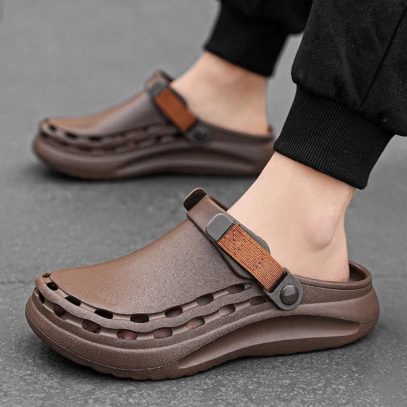 Men's EVA clogs with vent holes along the sides, a pivoting heel strap and a thick sole - brown