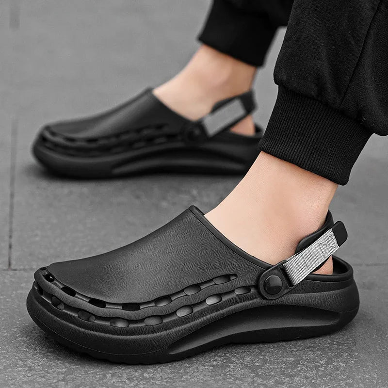 Men's EVA clogs with vent holes along the sides, a pivoting heel strap and a thick sole - black