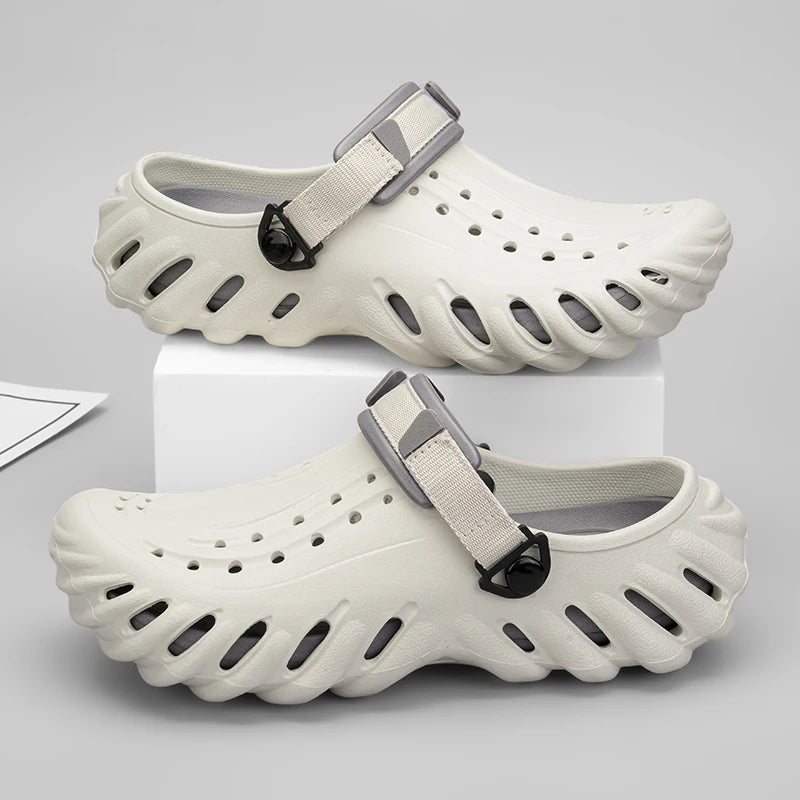 Men's EVA clogs with a ridged sole, vent holes on top and an adjustable heel strap