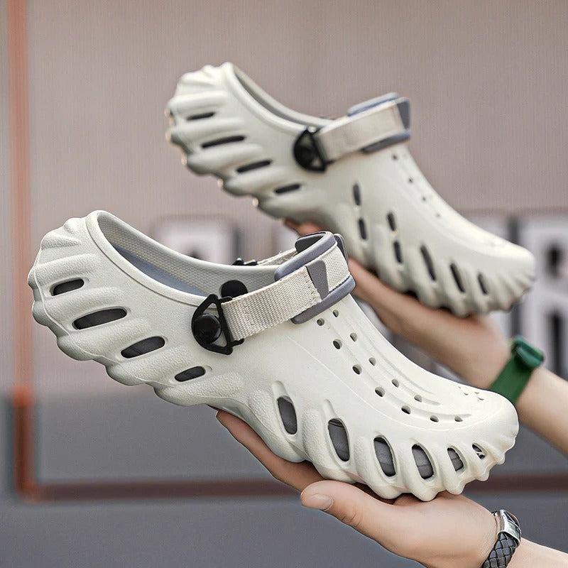 Men's EVA clogs with a ridged sole, vent holes on top and an adjustable heel strap - view 2