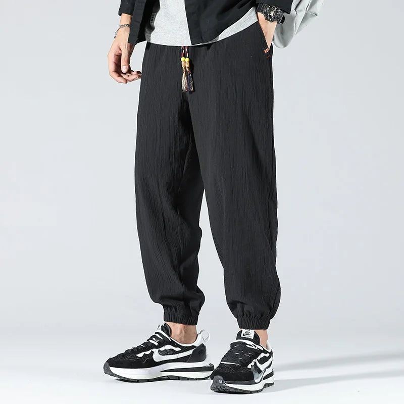 Men's lightweight cotton linen trousers with elasticated cuffs and a beaded drawcord - view 5