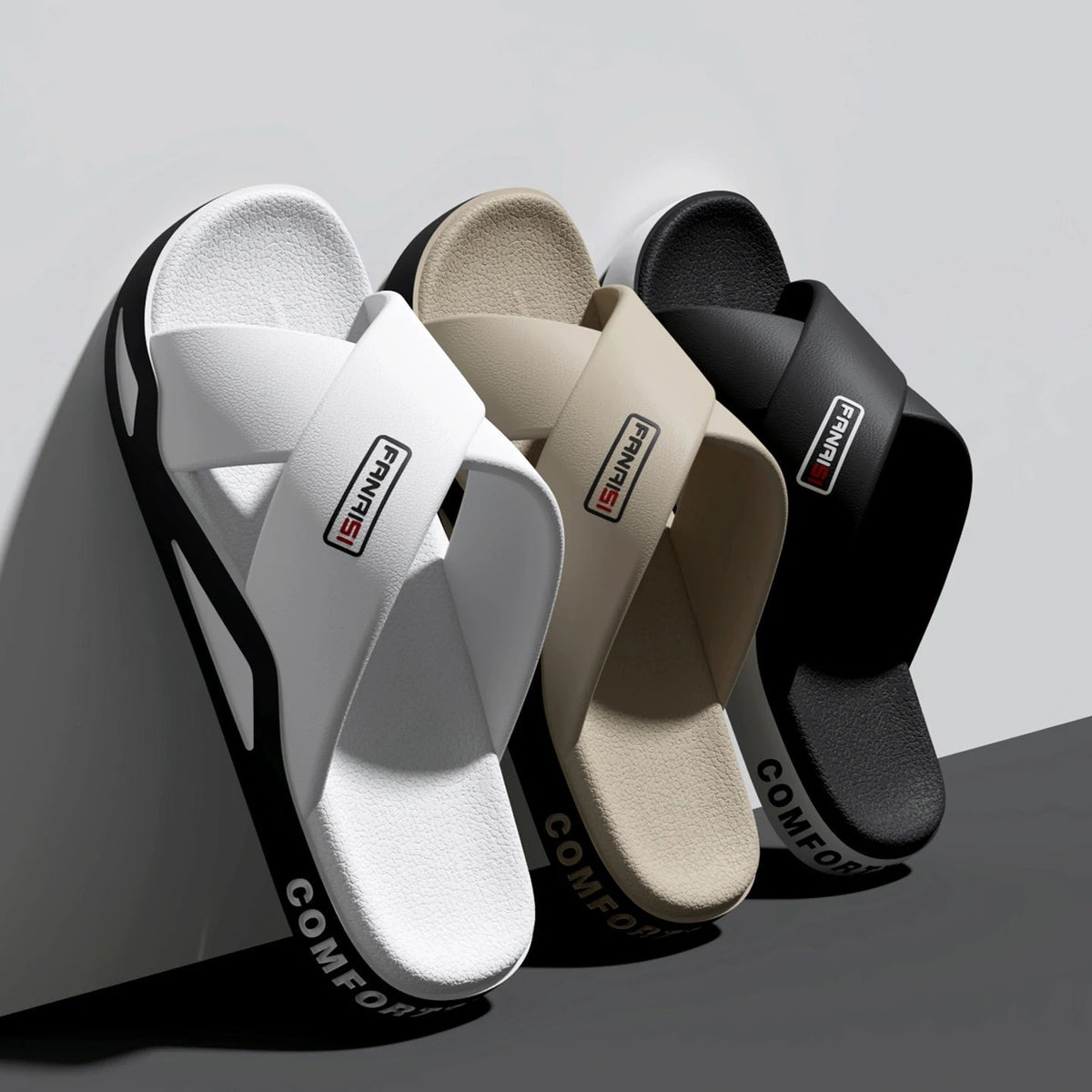 Men's sliders with crossed straps over the instep, textured footbed and thick sole