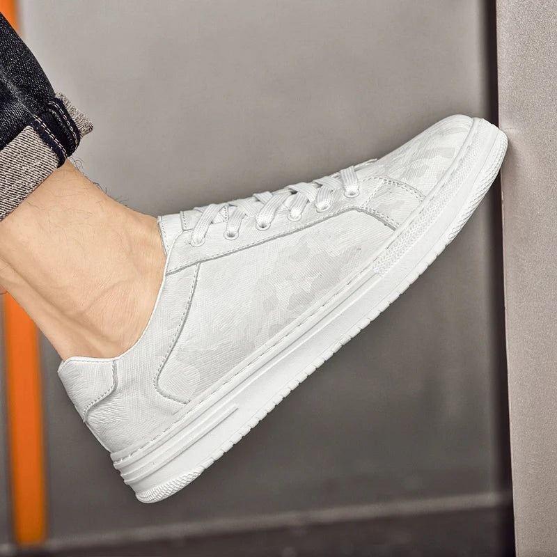 Men's low faux leather trainers with an embossed geometric pattern and a white rubber sole - view 6