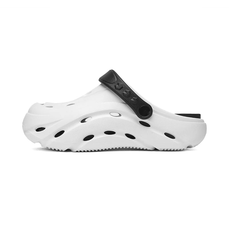 EVA clogs with a closed toe, vent holes, thick sole and pivoting heel strap - white