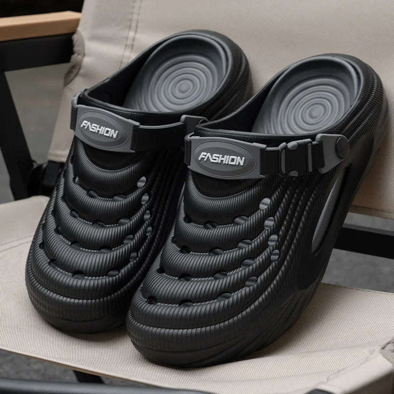Men's clogs in EVA with vent holes, thick ribbed sole and buckle heel strap - view 3