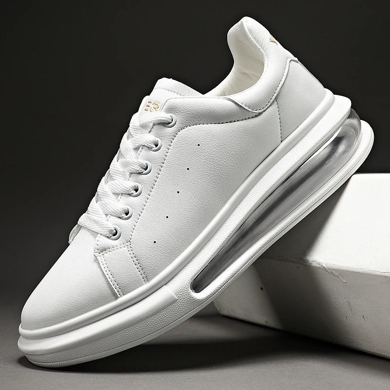 Men's faux leather trainers with a thick sole, visible air cushion and suede-look heel piece - white