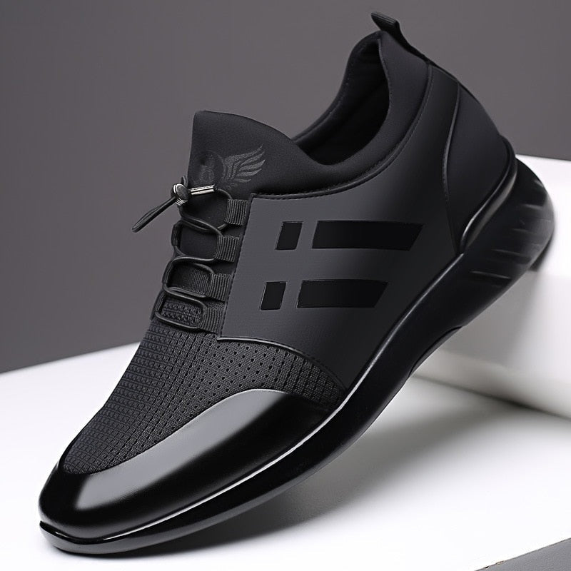Men's faux leather trainers with perforated mesh and elastic toggle laces - view 2
