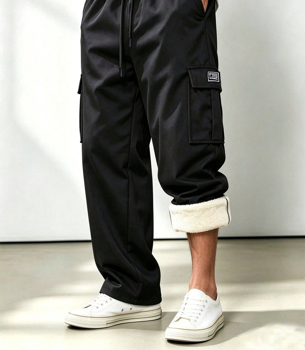 Fleece-lined cargo trousers for men with a drawcord waist, thigh flap pockets and a straight leg - black