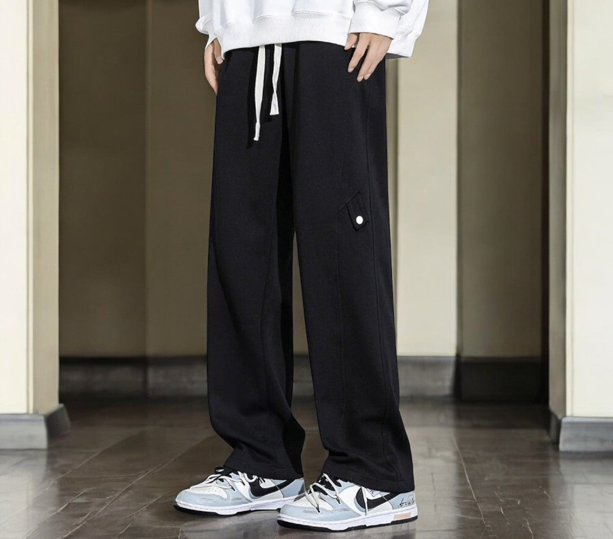 Men's fleece-lined joggers with a straight leg and a popper tab on the thigh - black