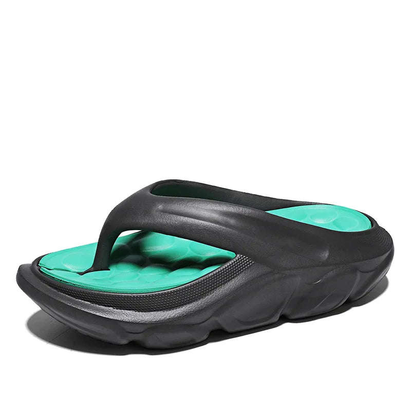 Men's EVA flip flops with thick sole, pebble-shaped nubbed footbed and wide strap - black/green