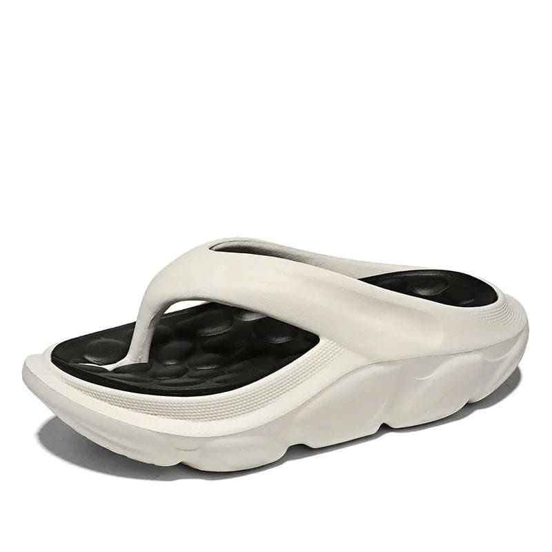 Men's EVA flip flops with thick sole, pebble-shaped nubbed footbed and wide strap - white/black