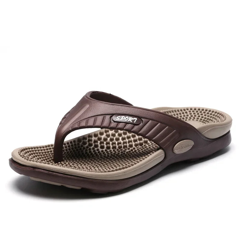 Flip flops with a studded footbed, wide toe strap and sole with tread - brown