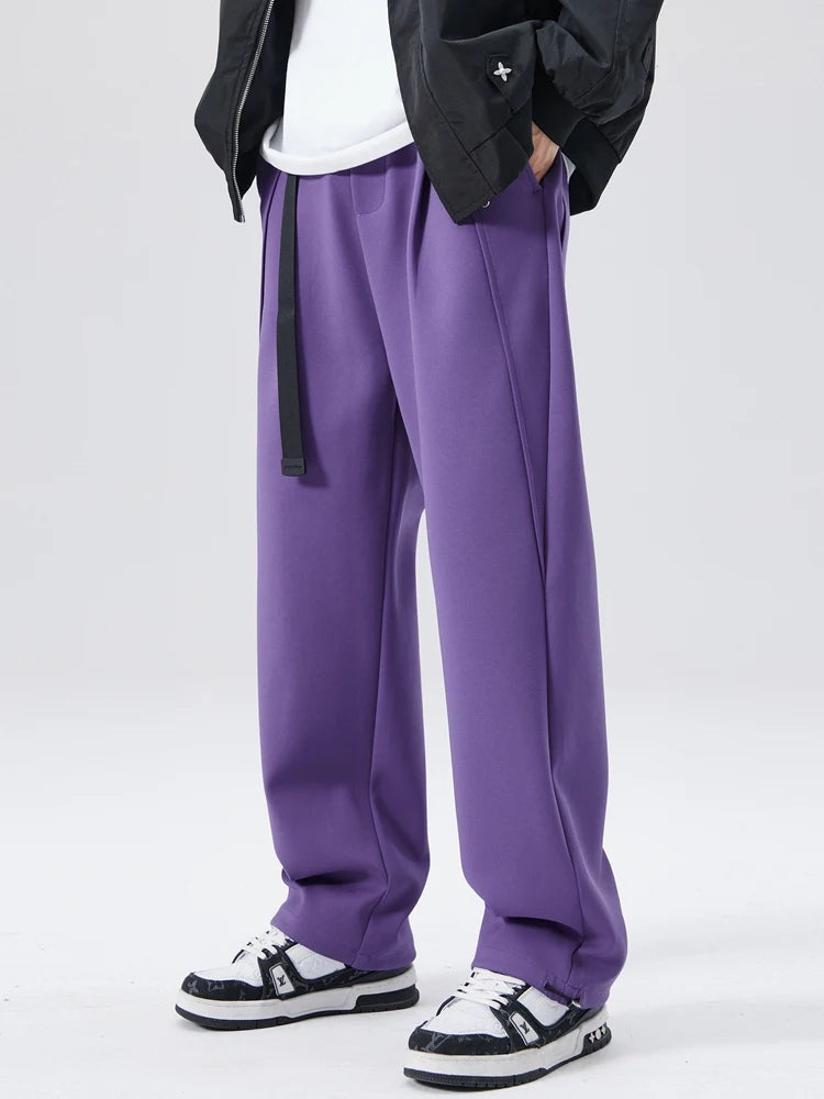 Men's heavyweight joggers with a built-in belt, front pleats and elasticated cuffs at the ankle - purple
