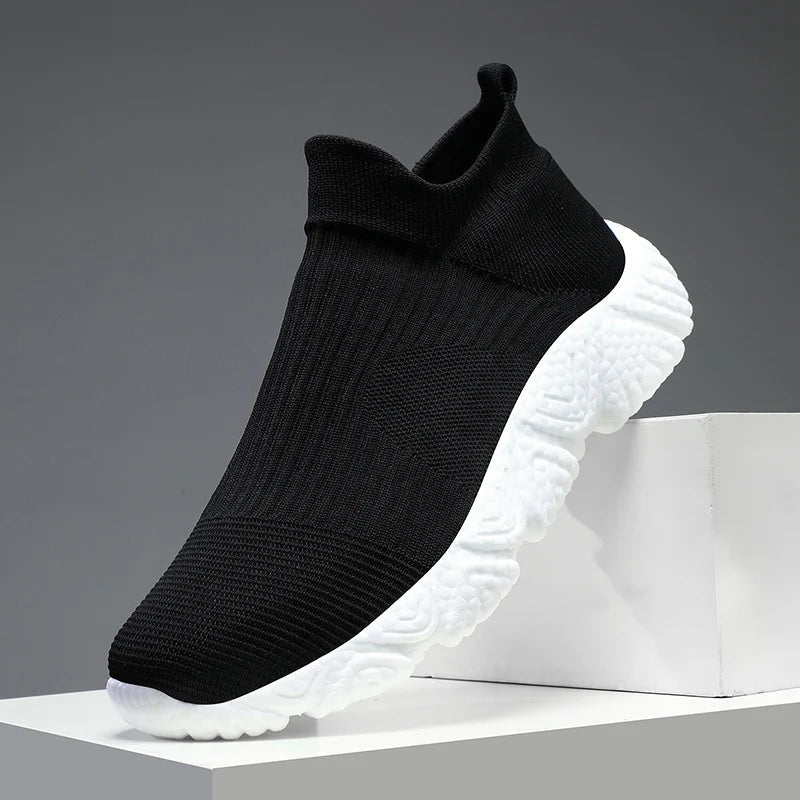 Men's knit slip-on trainers with a sock collar and a chunky textured foam sole - view 5