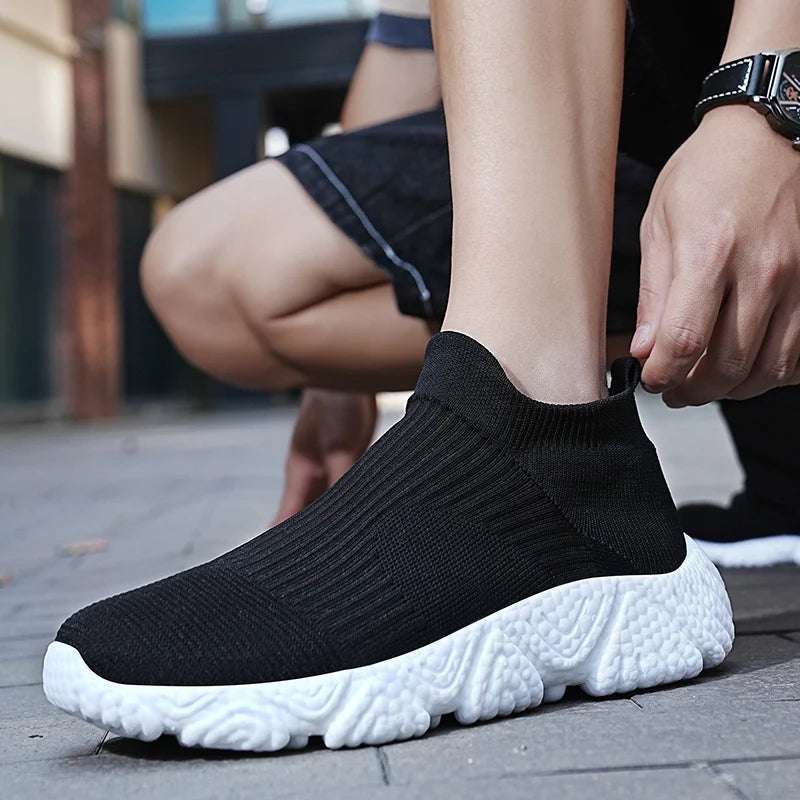 Men's knit slip-on trainers with a sock collar and a chunky textured foam sole - view 7
