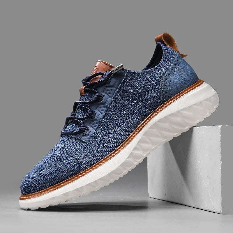 Men's knit trainers with a faux leather brogue heel, elastic laces and a white diamond-tread sole - denim blue