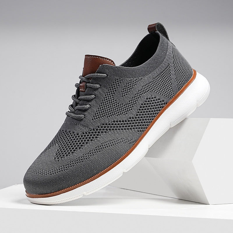 Men's knit trainers with trim and heel loop in tan faux leather and a light sole - grey