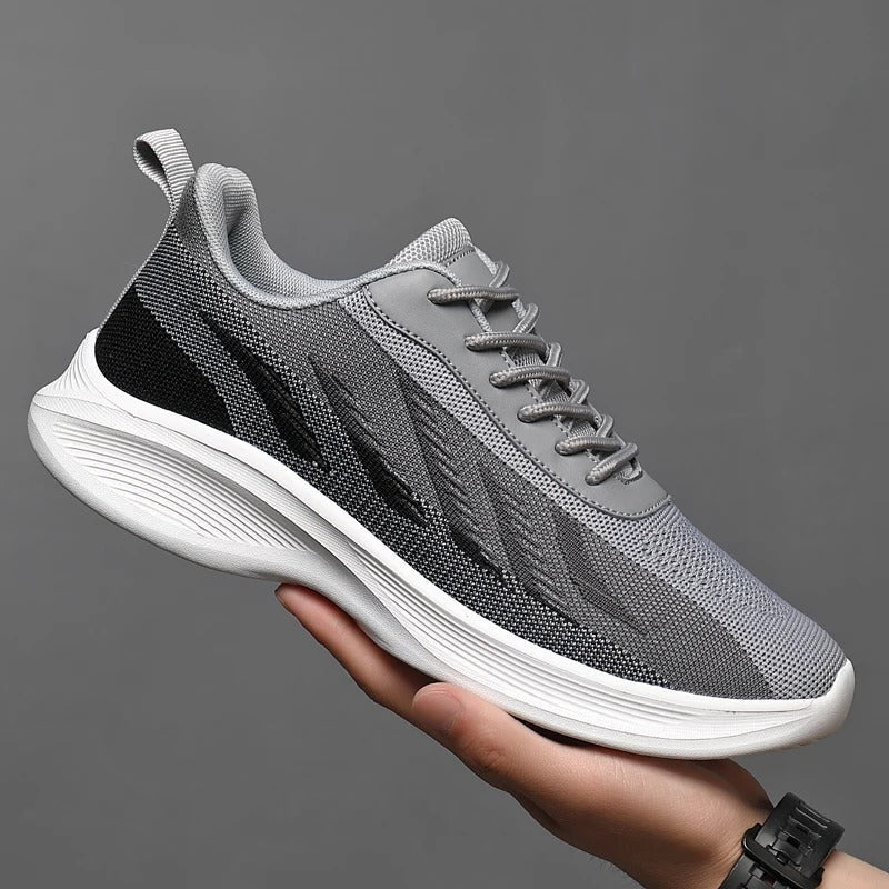 Men's lightweight mesh trainers with a chevron pattern in a colour gradient and a curved white sole - grey
