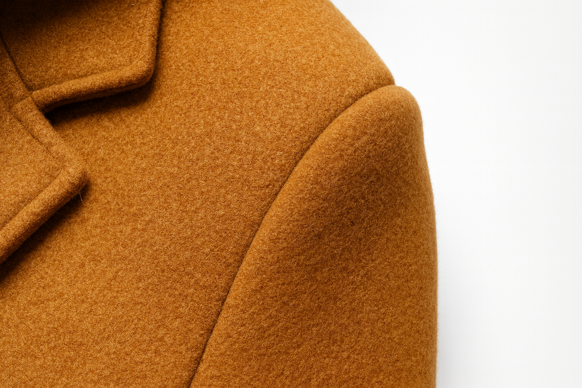Men's longline overcoat with notch lapels and a zip-in hooded insert