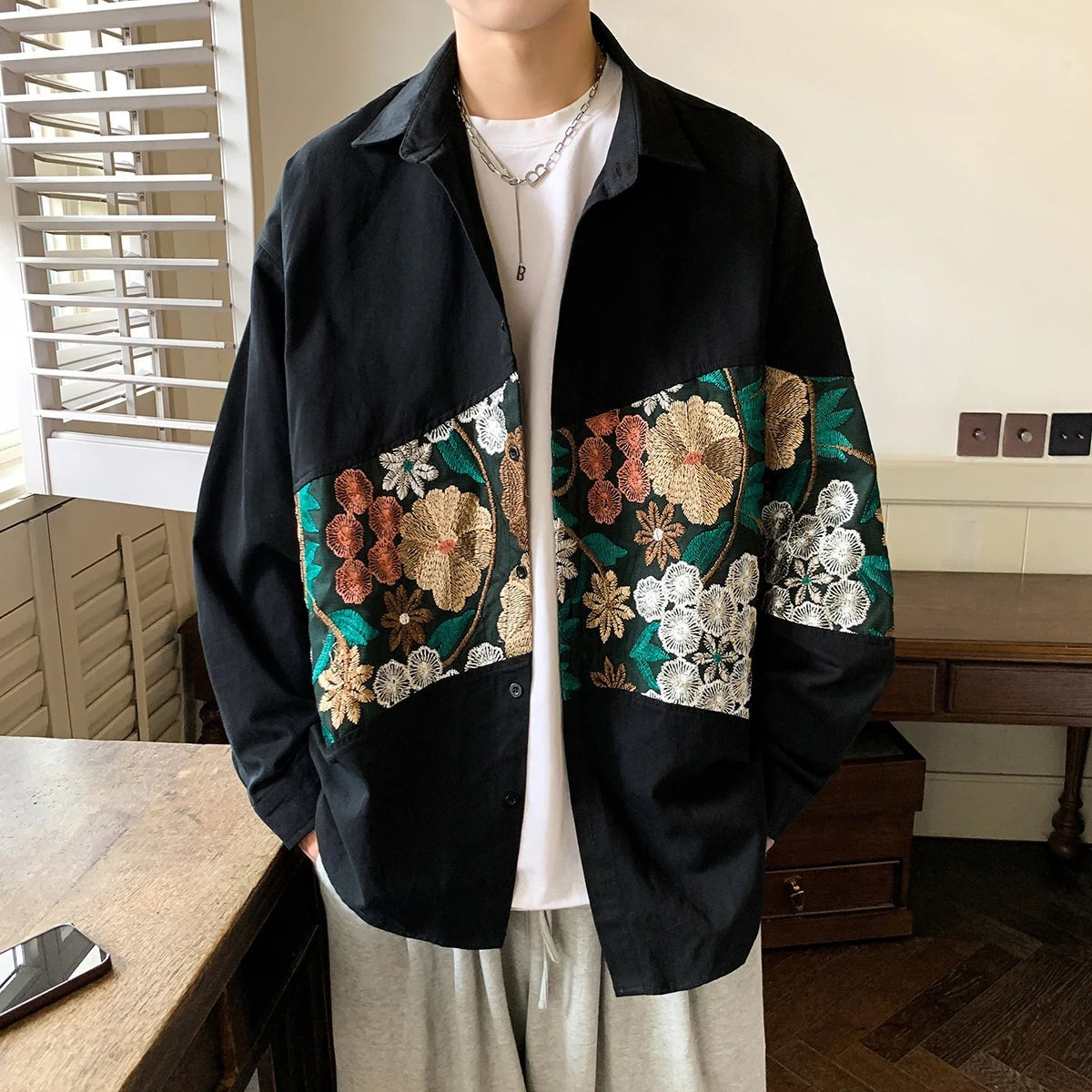 Men's oversized overshirt with an embroidered floral band and button front - black