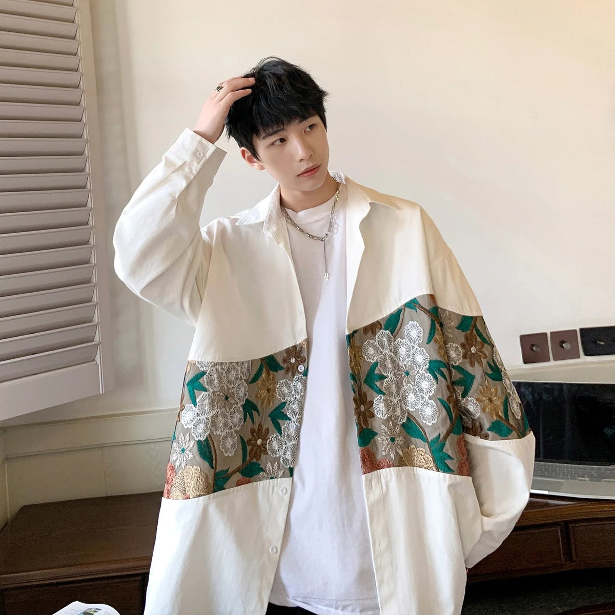 Men's oversized overshirt with an embroidered floral band and button front - white