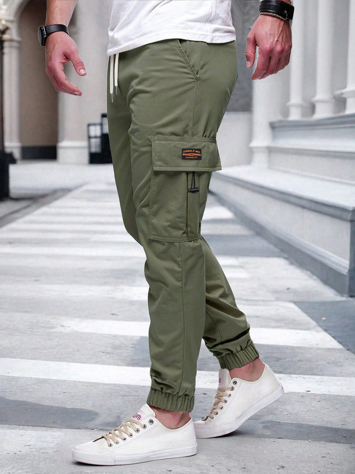 Relaxed cargo joggers for men with a drawcord waist, thigh flap pockets and cuffed ankles - view 11