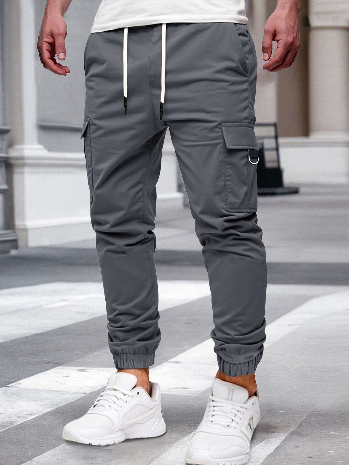 Relaxed cargo joggers for men with a drawcord waist, thigh flap pockets and cuffed ankles - grey