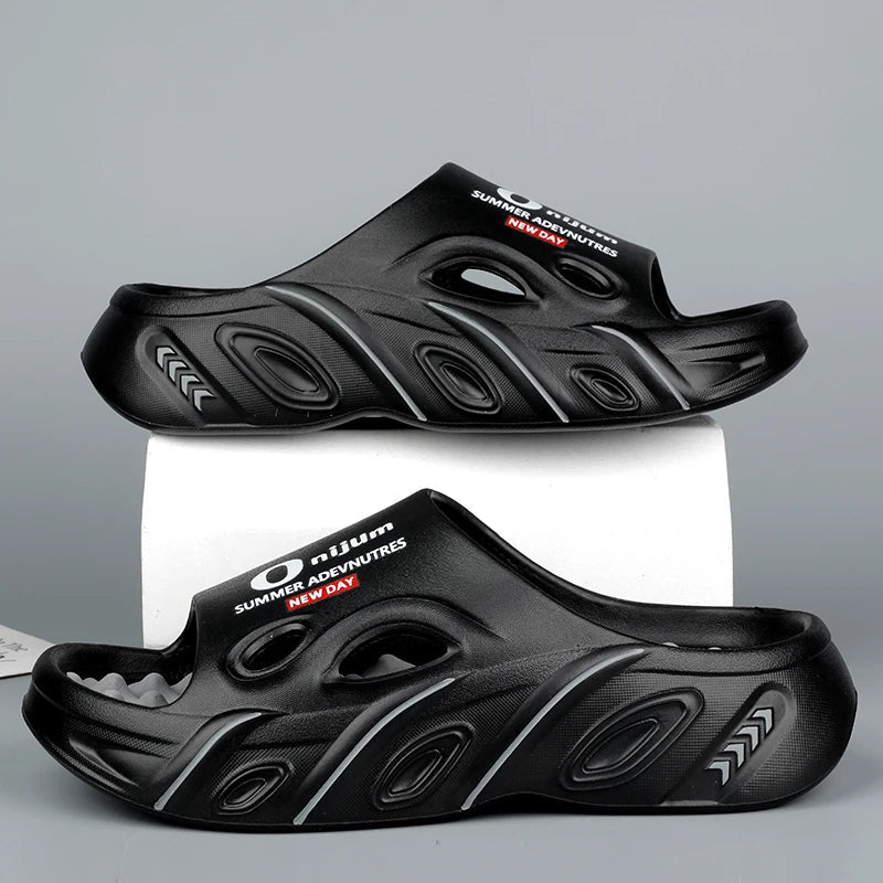 Men's EVA sliders with nubbed footbed, wide vented band and thick sole - black/grey