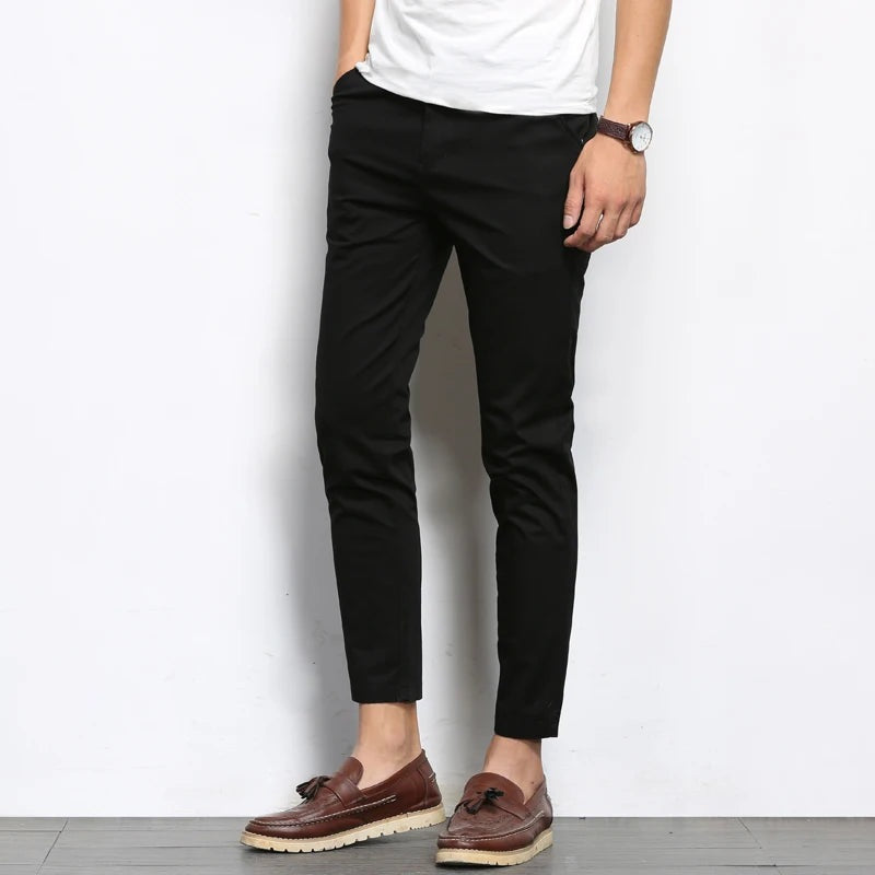 Men's slim fit ankle-length chino trousers with a tapered leg and belt loops - black
