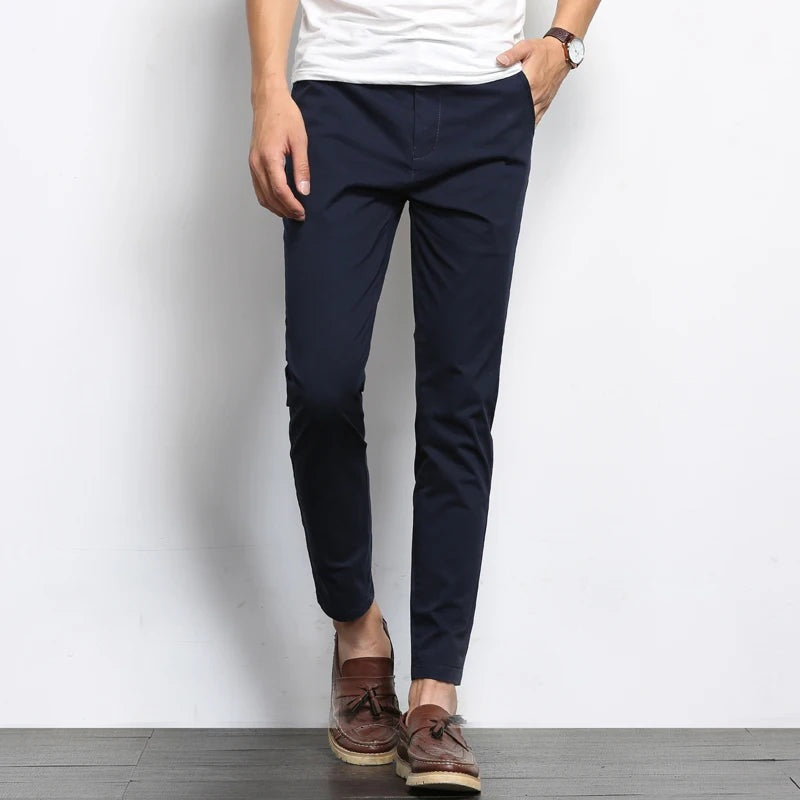 Men's slim fit ankle-length chino trousers with a tapered leg and belt loops - navy