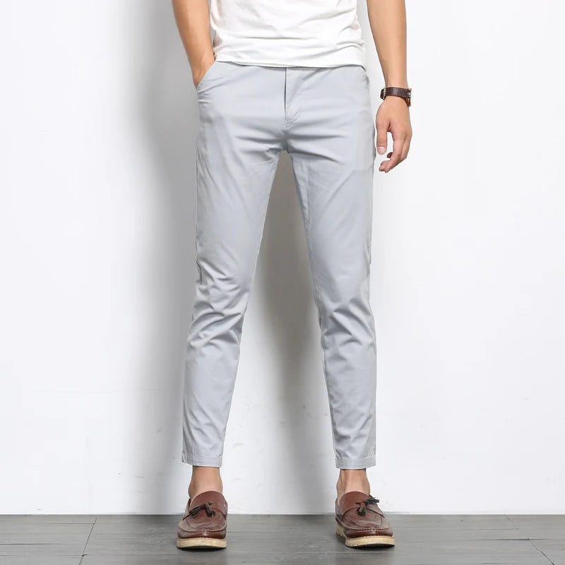 Men's slim fit ankle-length chino trousers with a tapered leg and belt loops - view 5