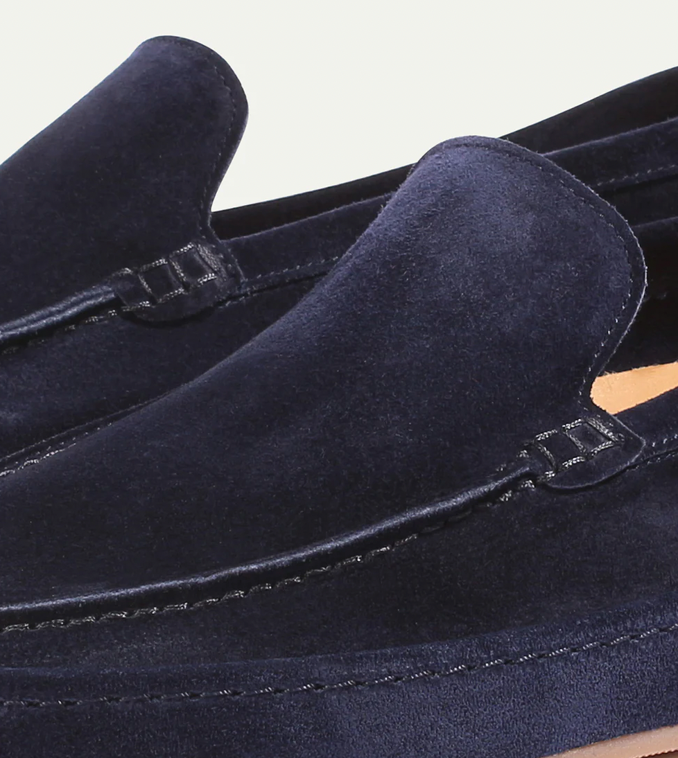 Men's slip-on loafers in a suede look with moc stitching and a wrapped sole edge