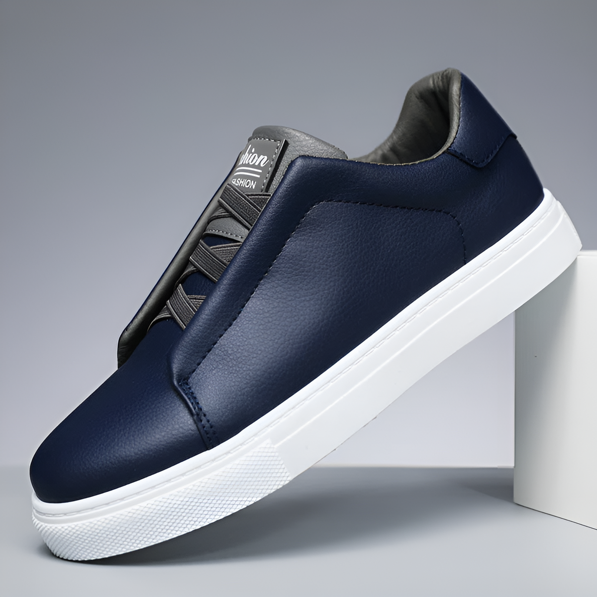 Men's slip-on trainers in faux leather with elastic laces