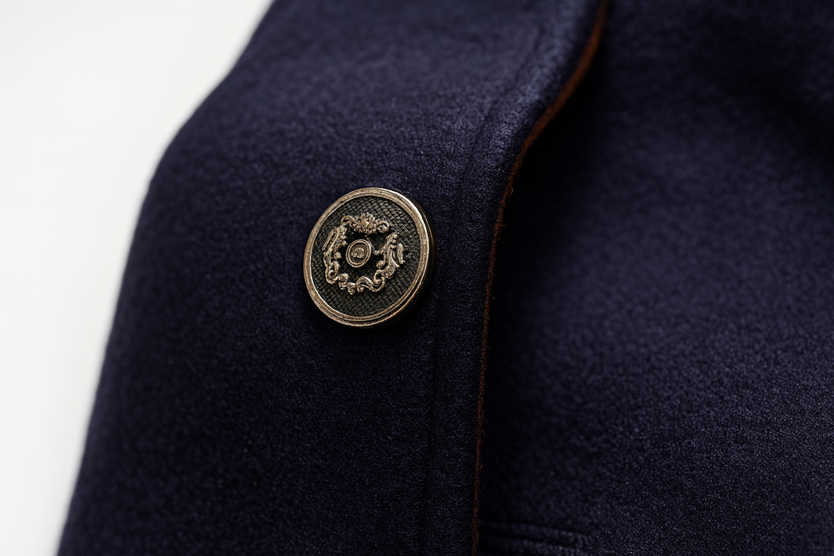 Men's stand collar coat in a wool blend with a knitted neck insert